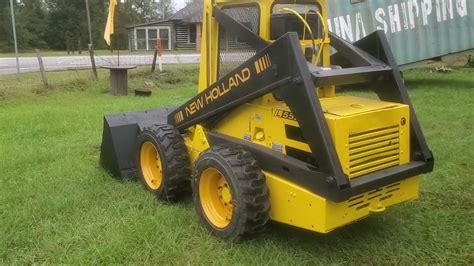 l555 new holland skid steer muffler|new holland l555 for sale.